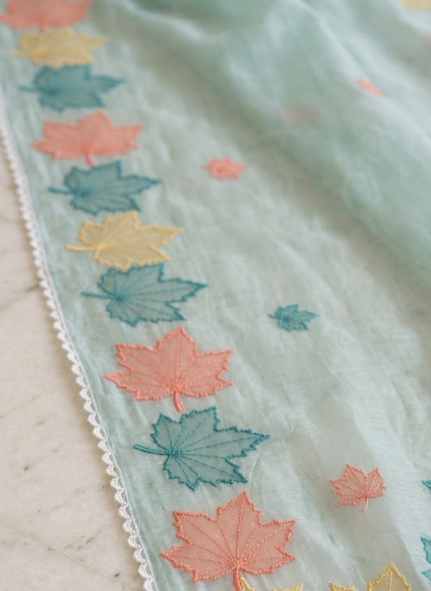 Aqua Blue Mul Chanderi Silk Saree with Multicolour Maple Leaf Organza Applique Work & Scalloped Border