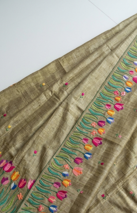 Pure Tussar Silk Saree In Mehendi Green With Multicolored Tulip Embroidery