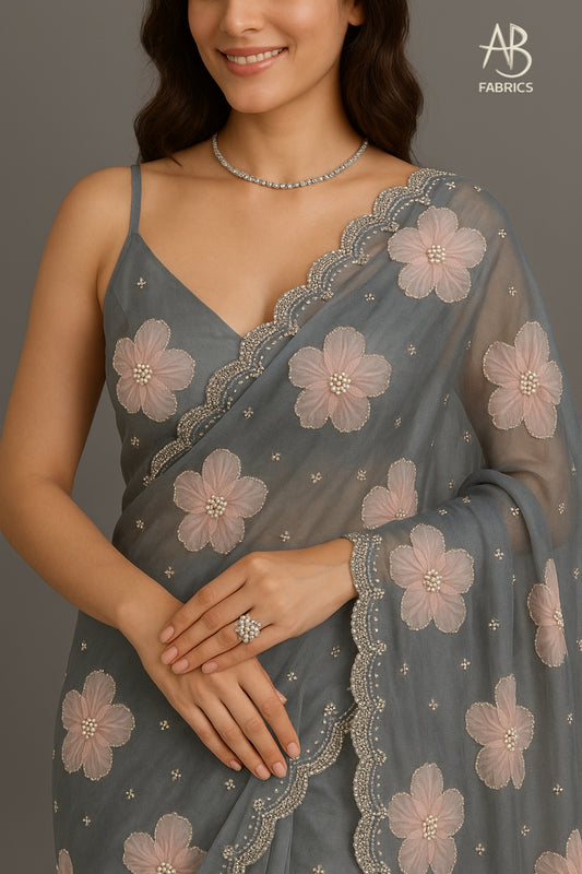 Elegant Charcoal Grey Organza Saree with Blush Pink Floral Work and Beaded Scalloped Border