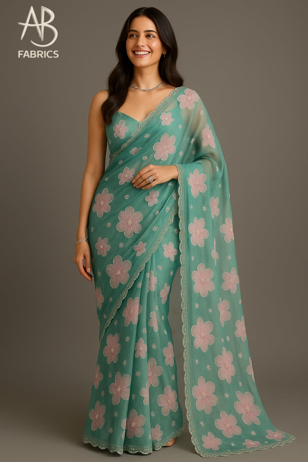 Serene Mint Green Organza Saree with Pink Floral Handwork and Pearl Accents